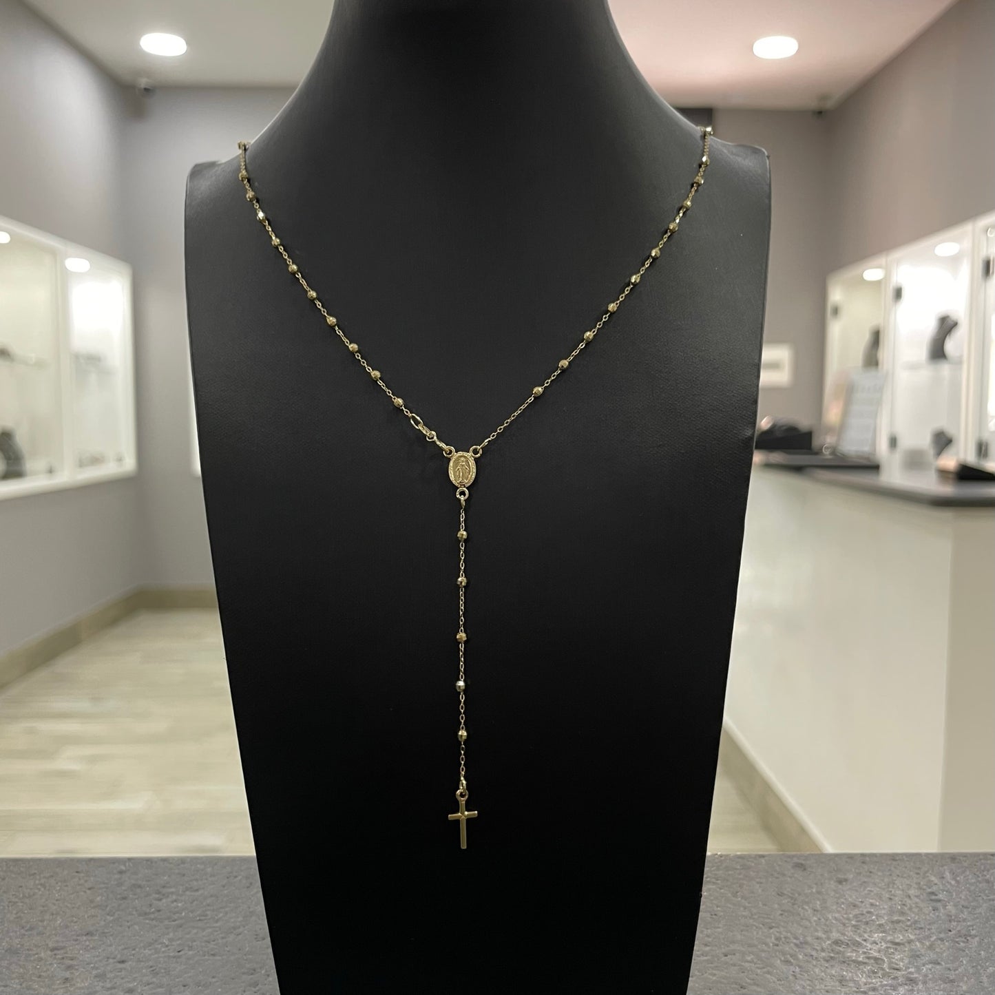Collana rosario con sfere sfaccettate oro